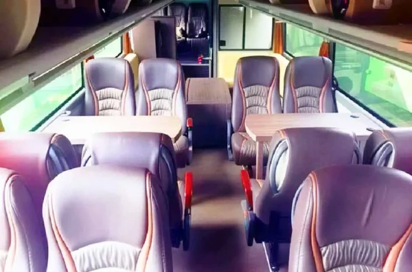 menyewa bus dengan kursi yang bisa di custom