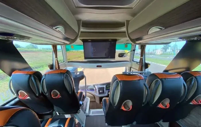 sewa bus pariwisata Depok dengan TV LED dan Wi-Fi